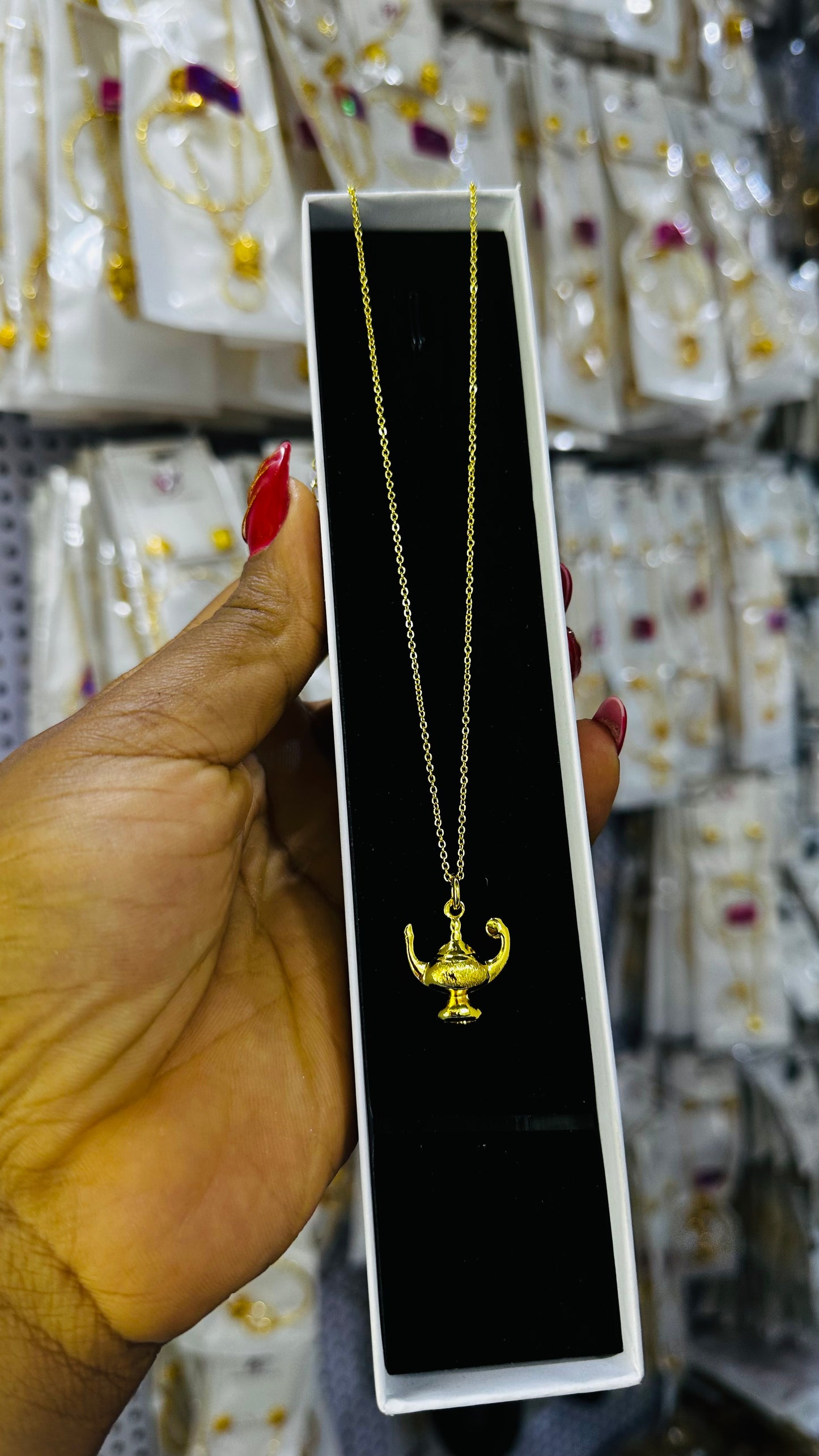 Tiny gold replica chain