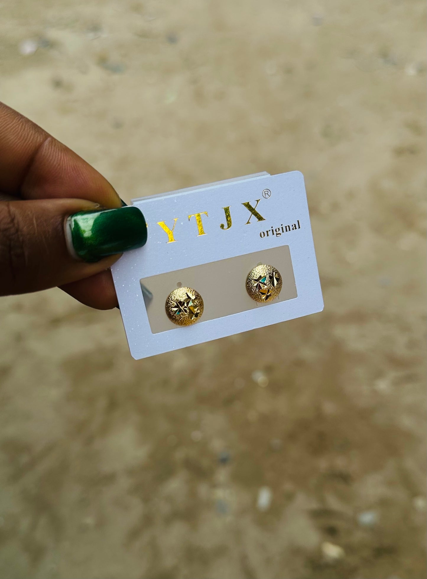 Tiny gold earrings