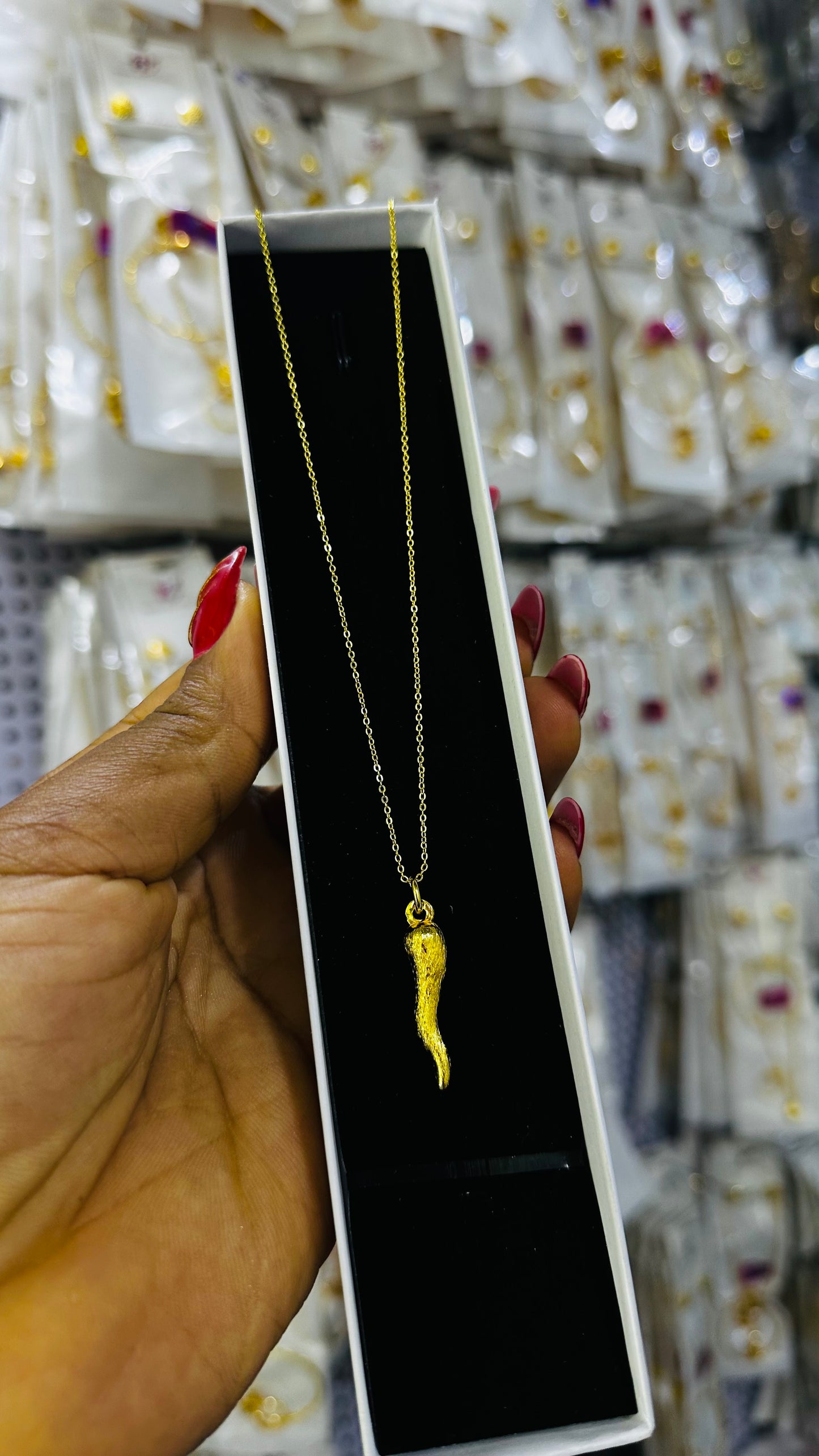 Tiny gold replica chain