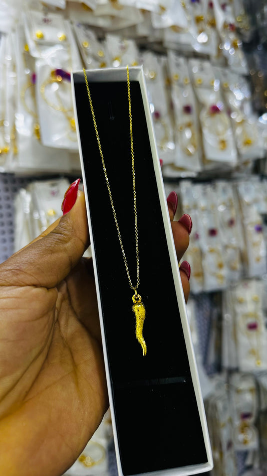 Tiny gold replica chain