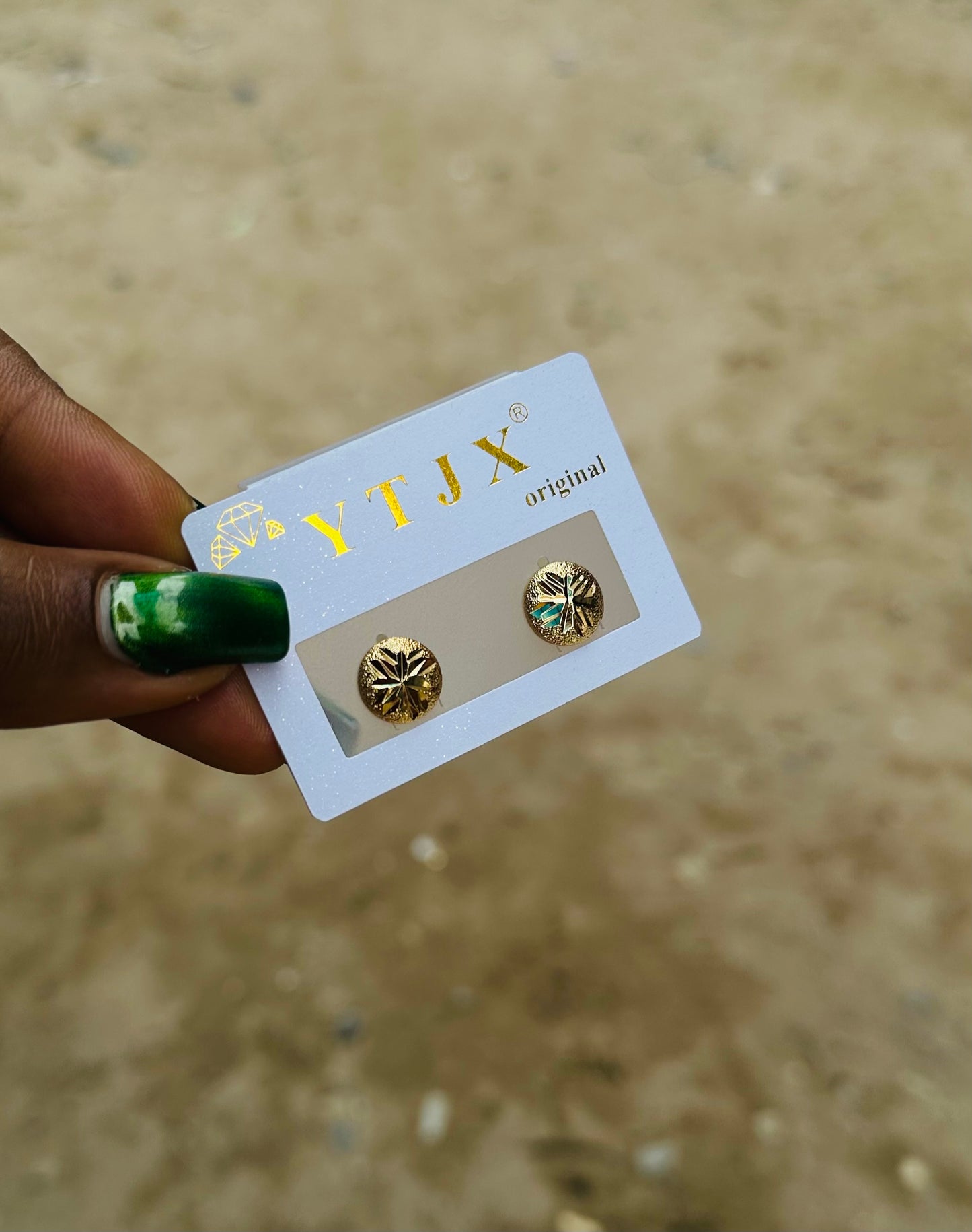 Tiny gold earrings