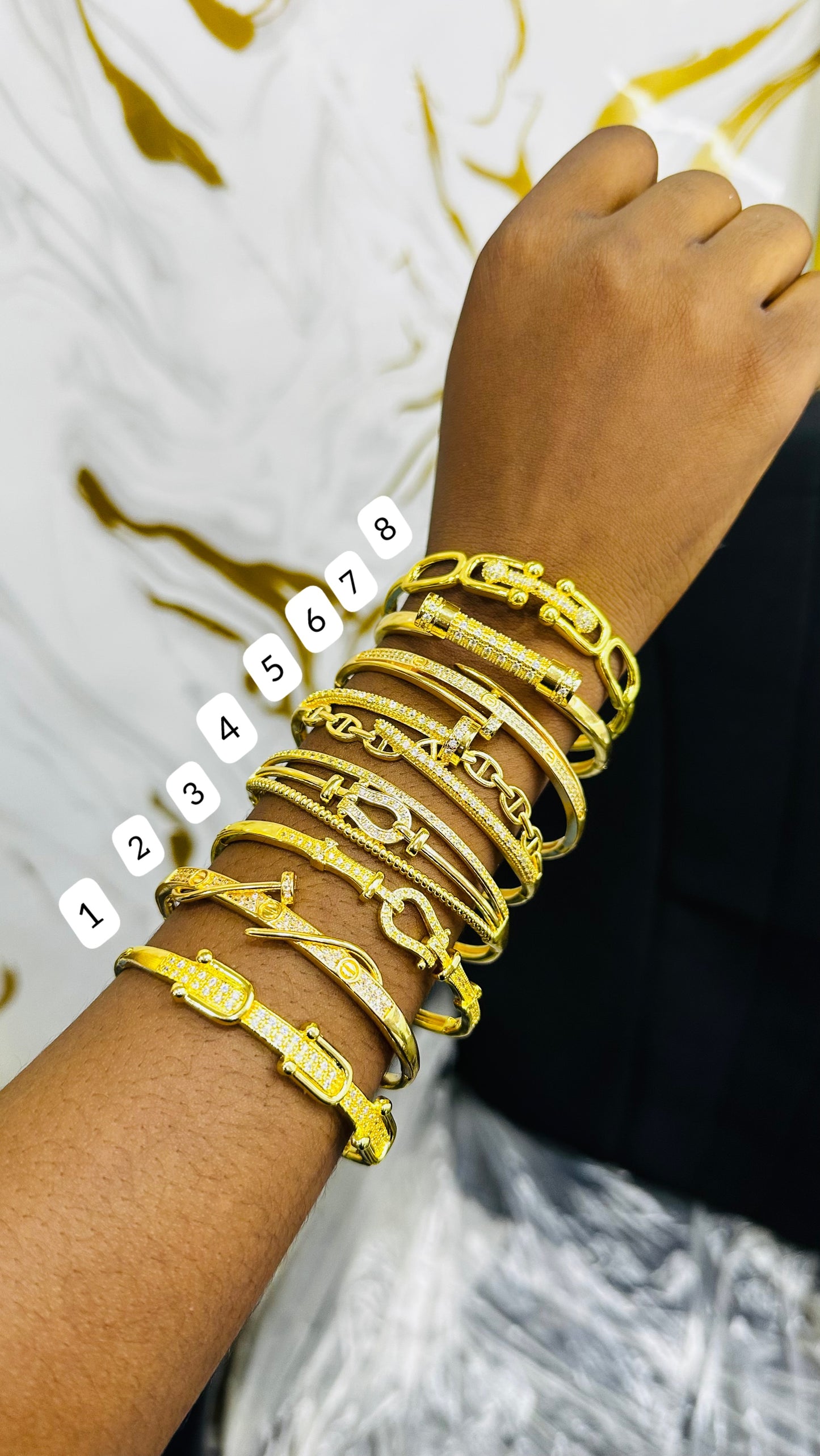 Gold replica CZ bangles
