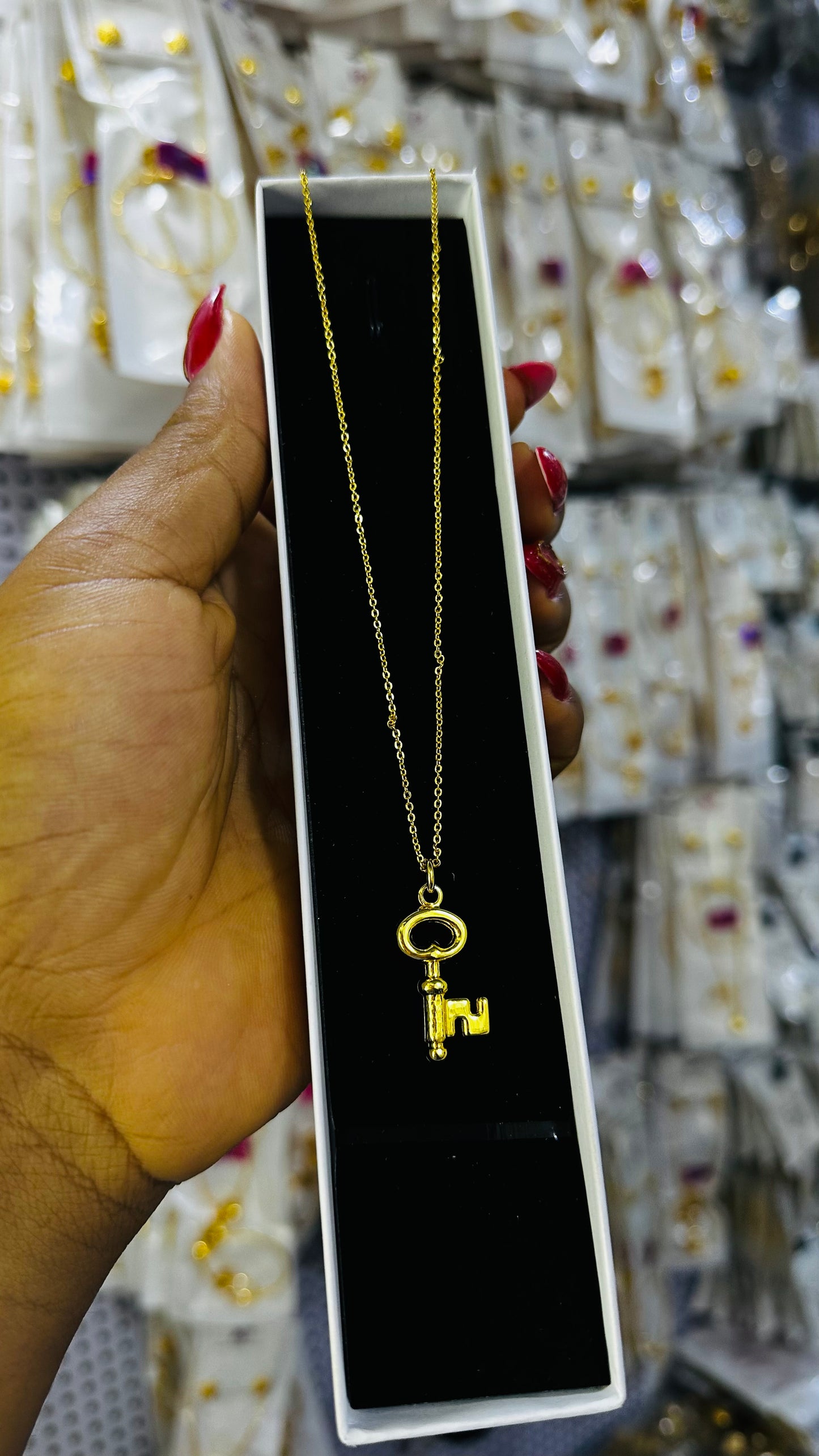 Tiny gold replica chain