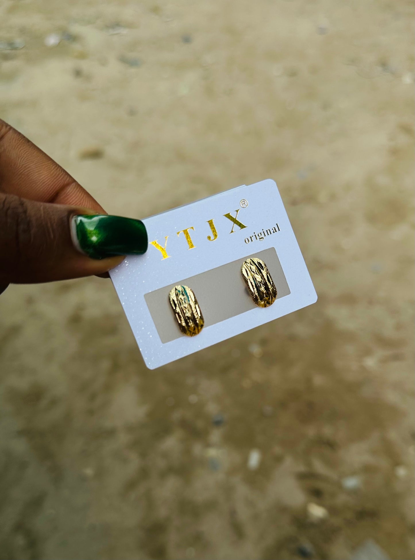 Tiny gold earrings