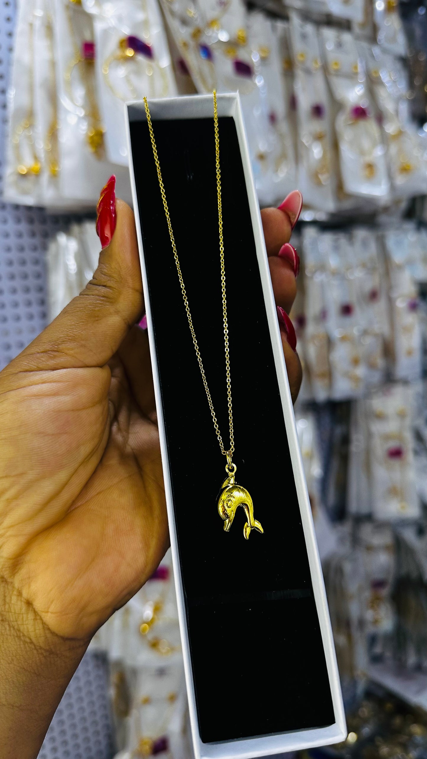 Tiny gold replica chain