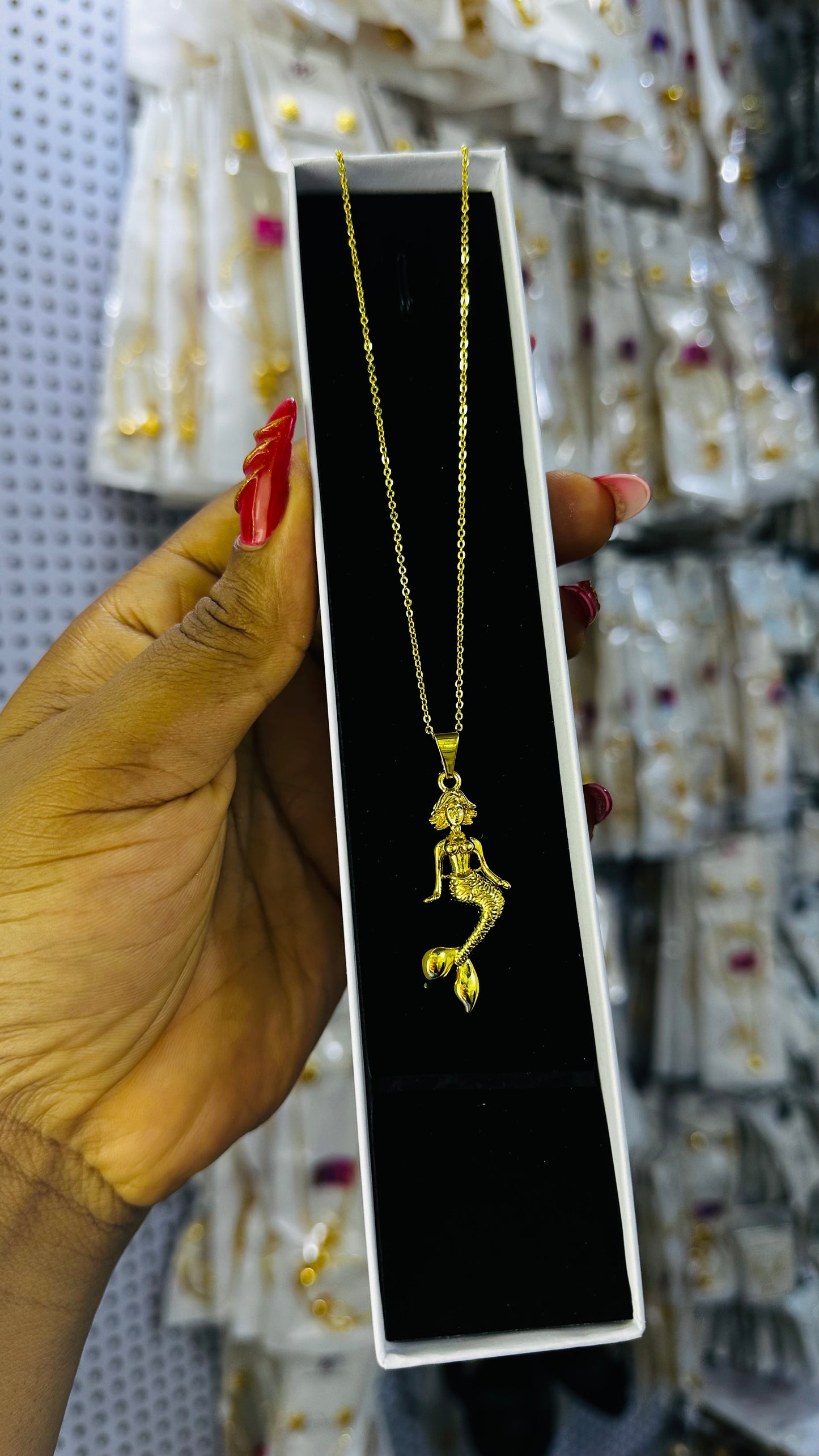 Tiny gold replica chain