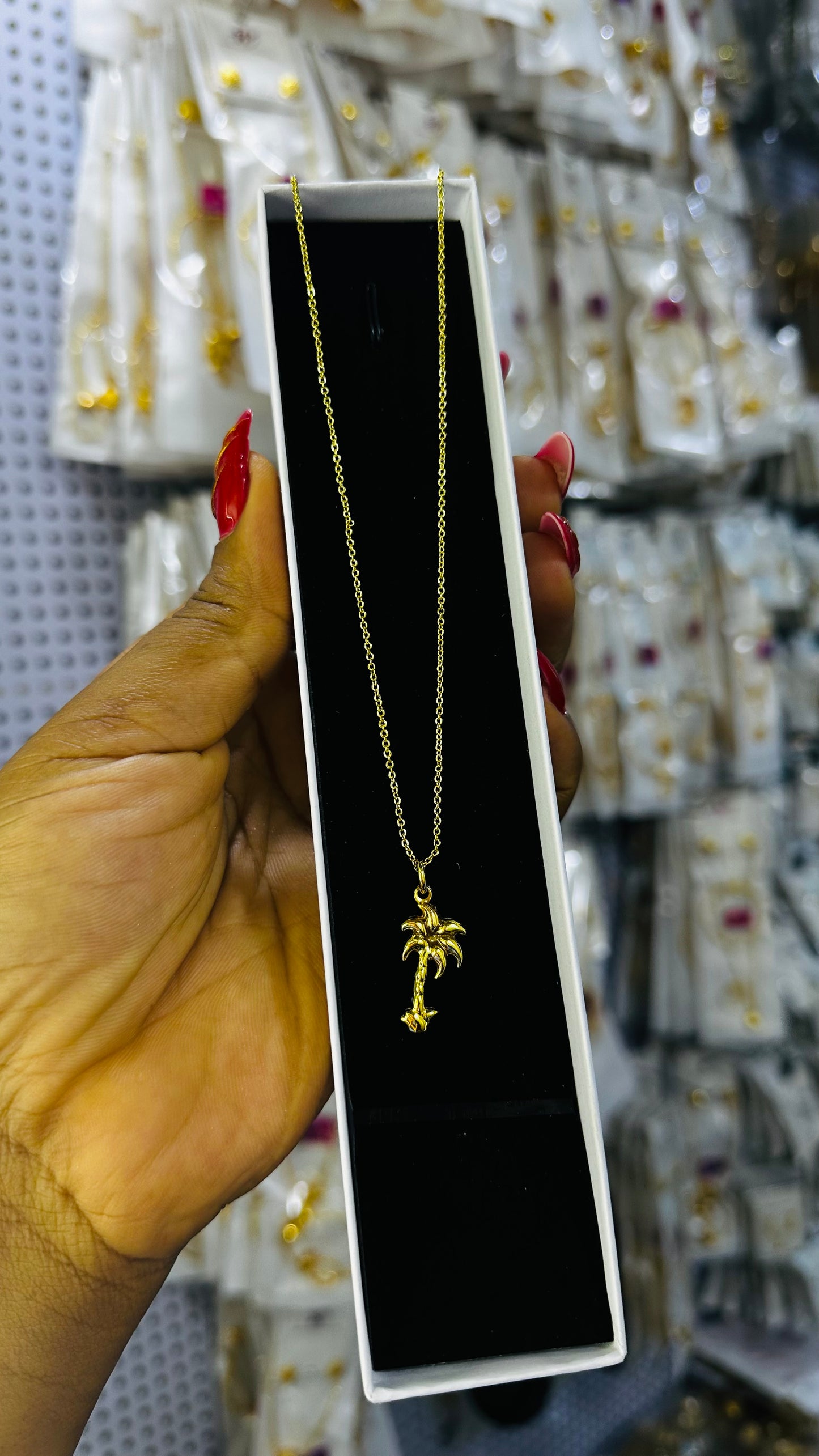 Tiny gold replica chain